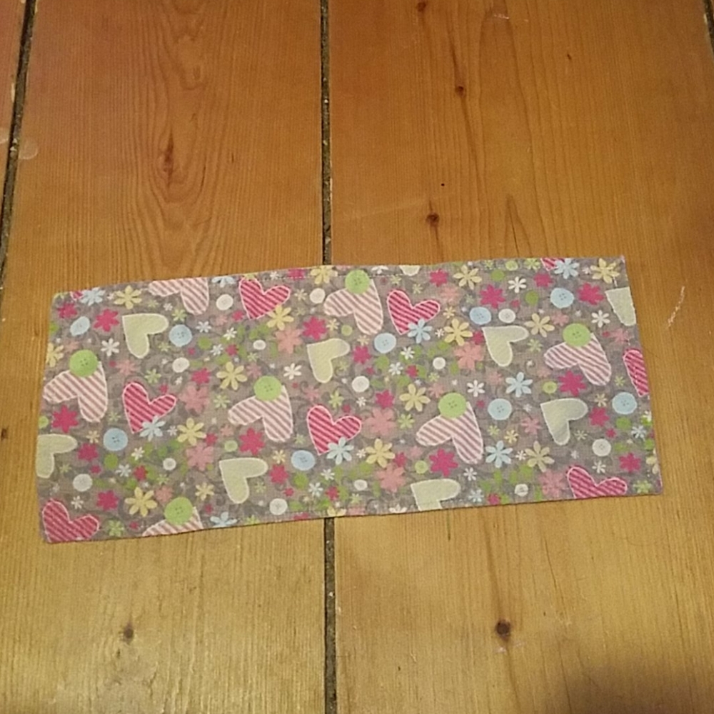 Double sided burp clothe for a baby.